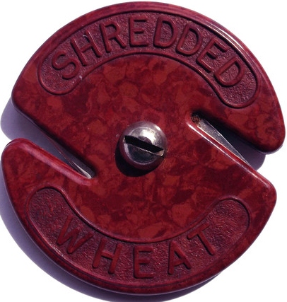 Vintage red mottled Bakelite Shredded Wheat string cutter  (1)